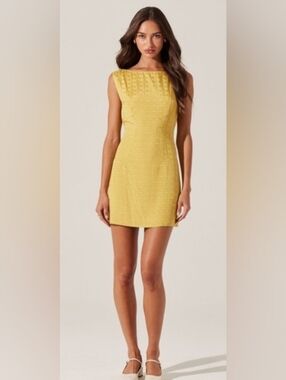 Astr Yellow Textured Sleeveless, Backless Mini Dress